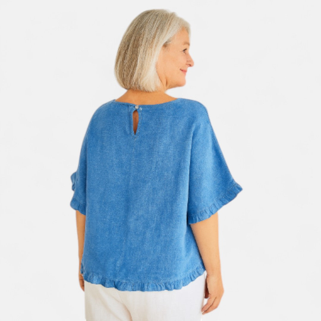Astrid™ – Blus med avslappnad passform och volanger