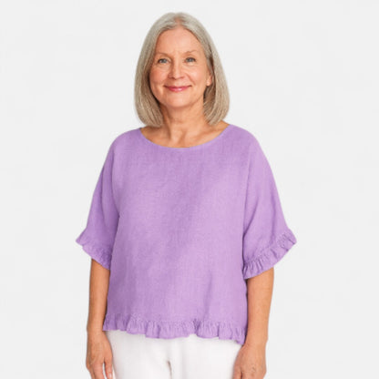 Astrid™ – Blus med avslappnad passform och volanger