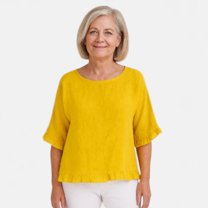 Astrid™ – Blus med avslappnad passform och volanger
