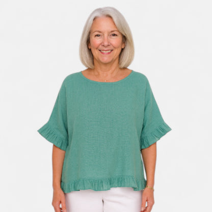 Astrid™ – Blus med avslappnad passform och volanger